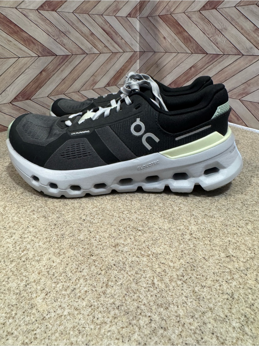 Ladies size 5 wide. On cloud runner 2 . Shadow/lima running or walking shoes.